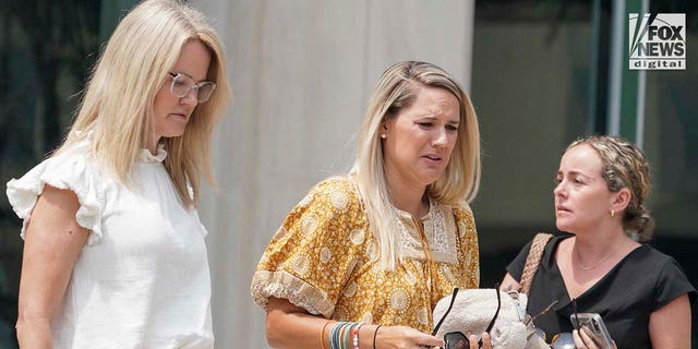 Friends and family of Natalie Holloway exit the federal courthouse