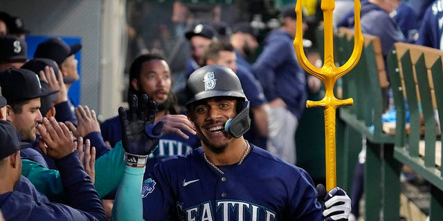 Julio Rodriguez in the dugout