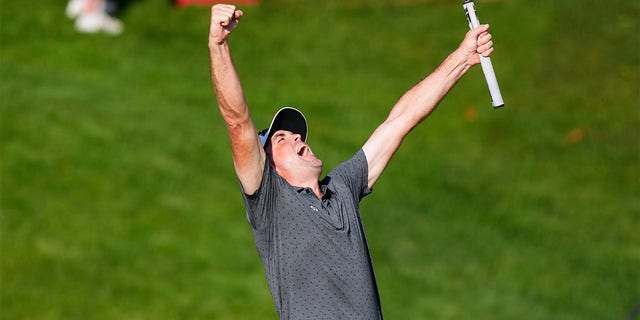 Keegan Bradley celebrates winning Travelers Championship