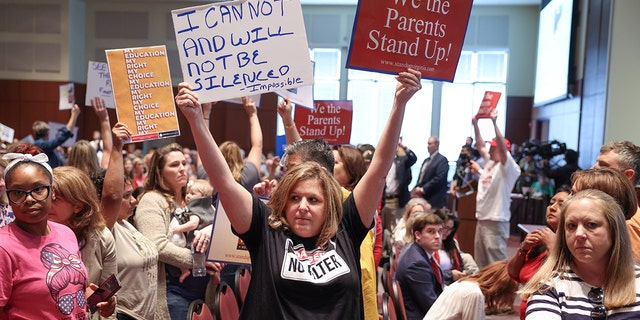 A Virginia School board meeting reflects a battle playing out across the country over a once-obscure academic doctrine known as Critical Race Theory, in Ashburn