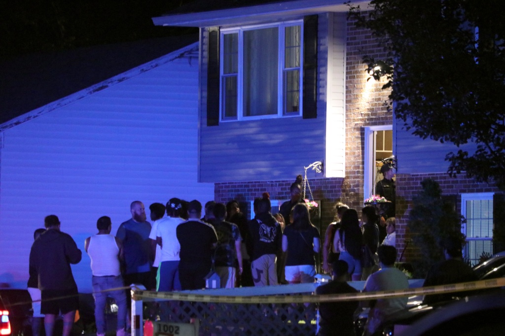 More people gather on a residential street in Annapolis, Md., where the deadly shooting occurred on June 11, 2023. 