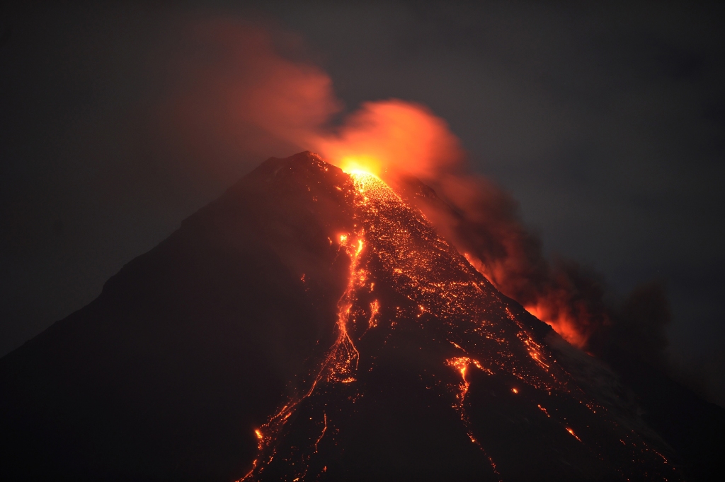 Mayon volcano spewing lava ash from its crater, as seen in Daraga town, south of Manila in Albay province on Jan. 28, 2018.