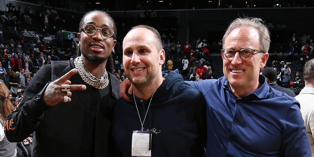 Quavo, Michael Rubin and Josh Harris pose for picture