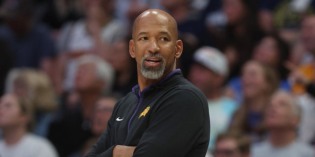 Monty Williams looks on court