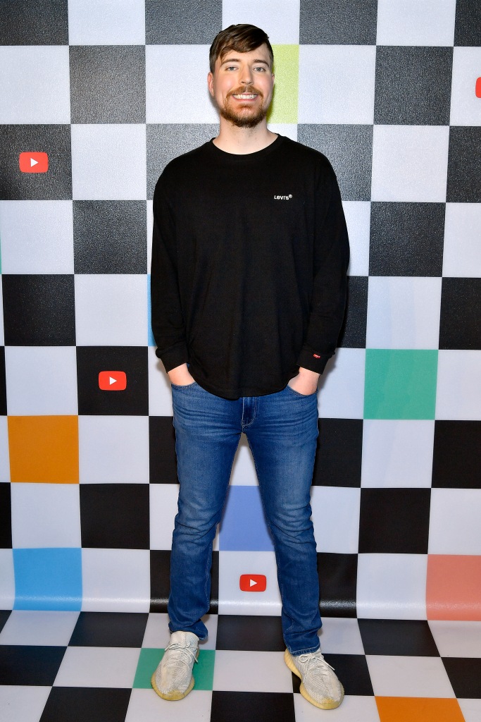 Mr. Beast in a photo against checkered wall