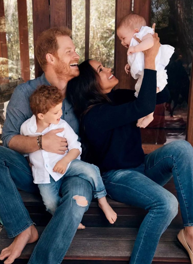 Harry and Markle are seen with Prince Archie and Princess Lili in a photo released in 2021. 