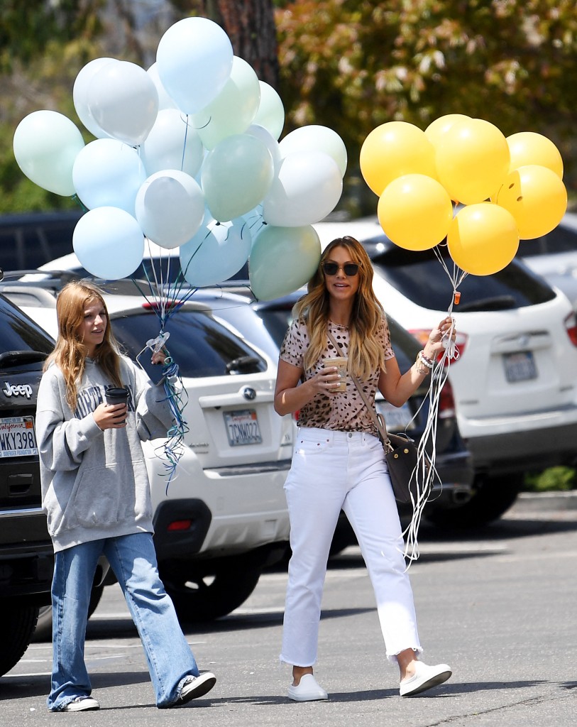 Christine Baumgartner bought two bouquets of birthday balloons on May 6 for their 16-year-old son Cayden's birthday while out with their youngest daughter Grace  in Montecito.