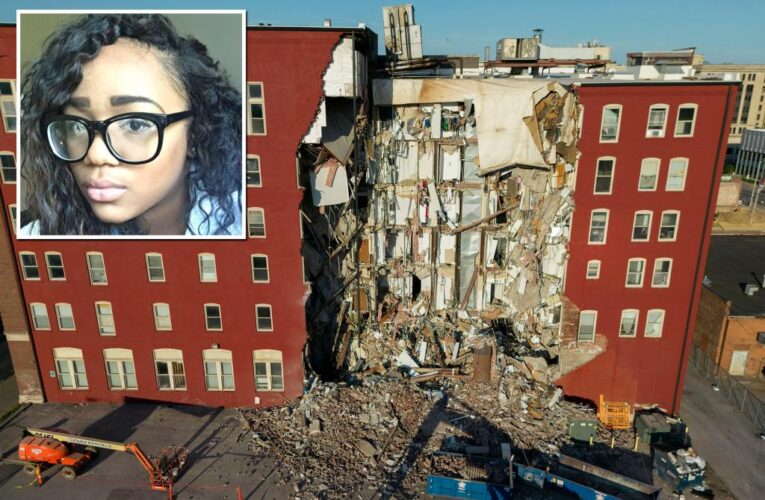 Woman has leg cut off to free her from collapsed building