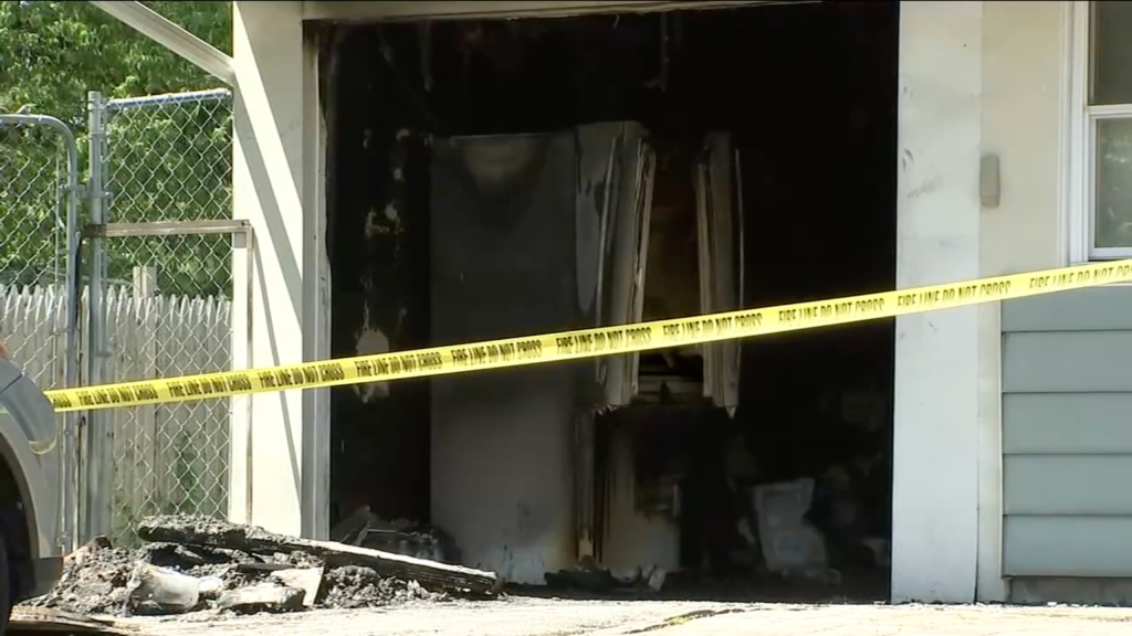 fire damage is pictured in the home's garage