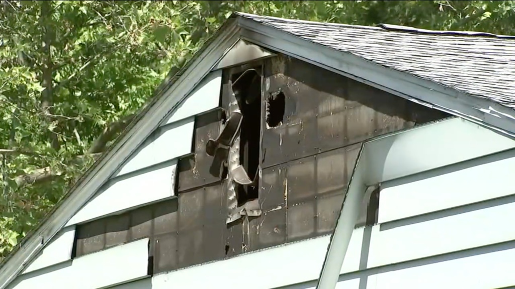 fire damage is pictured in the home's garage