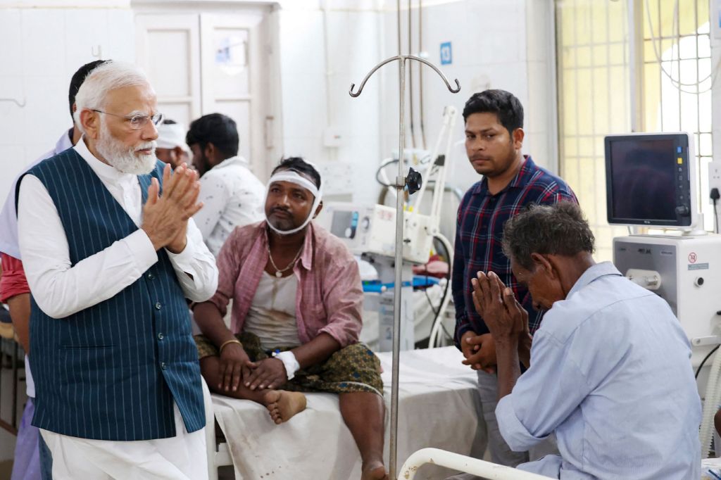 India's Prime Minister Narendra Modi visited a hospital to meet the victims of the collision.

