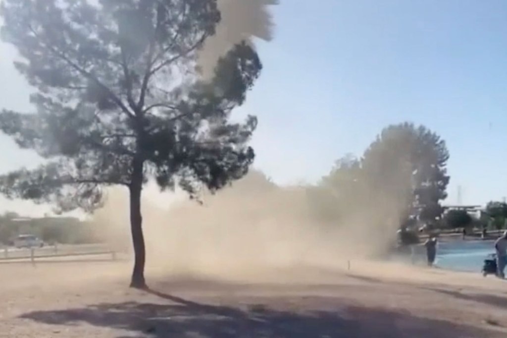 Footage shot by Arizona meteorologist Tyler Maio on Friday shows a dust devil swirling nearby and then heading straight toward him.