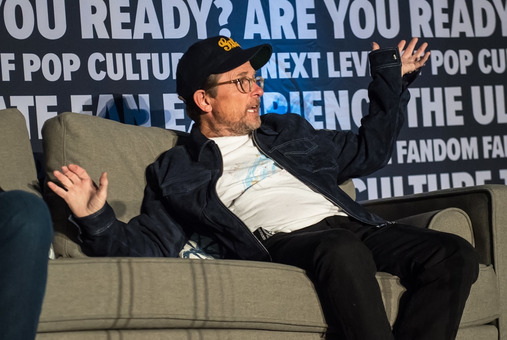 Michael J. Fox takes a tumble and falls on to the couch on stage during "Back to the Future" Q&A panel with actors Michael J. Fox, Christopher Lloyd and Tom Wilson at Fan Expo in Philadelphia, Pennsylvania, USA.
