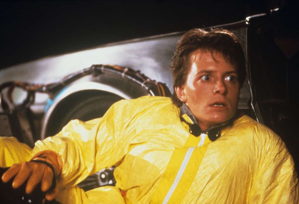 Michael J Fox looking worried wearing yellow in "Back to the Future." 