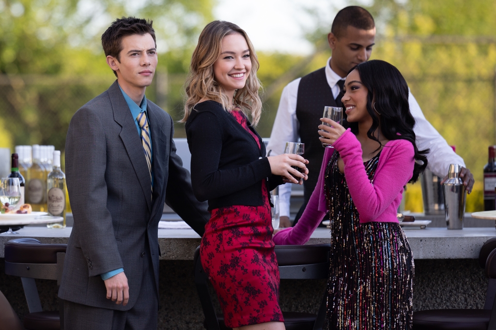 Luke (Griffin Gluck) Megan (Sadie Stanley) and Isabella (Lexi Underwood) stand outside at a party. 