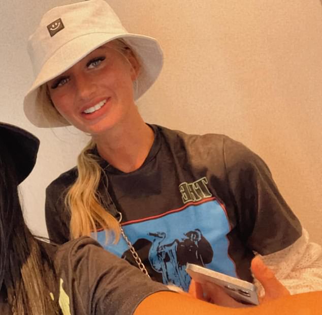 Georgia Bilham wears a bucket hat and t-shirt in a past photo. 