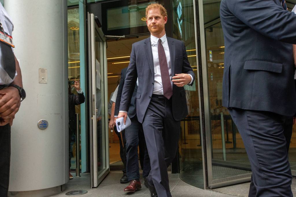 Prince Harry leaves court after MGN phone hacking trial.