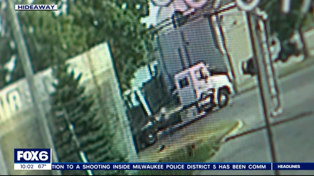 Still footage of the car being towed.