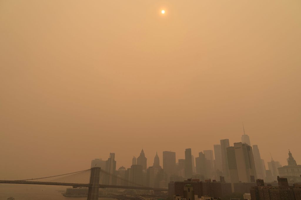 The pollution was so bad, that around 2 P.M. a bright orange hue had enveloped the city and photo-sensitive lights in Central Park had turned on. 