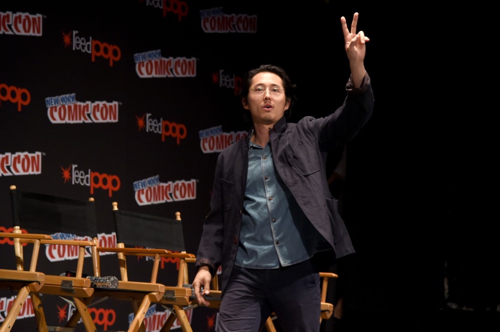 Steven Yeun attends AMC presents "The Walking Dead" at New York Comic Con at The Theater at Madison Square Garden in 2016 in New York City.