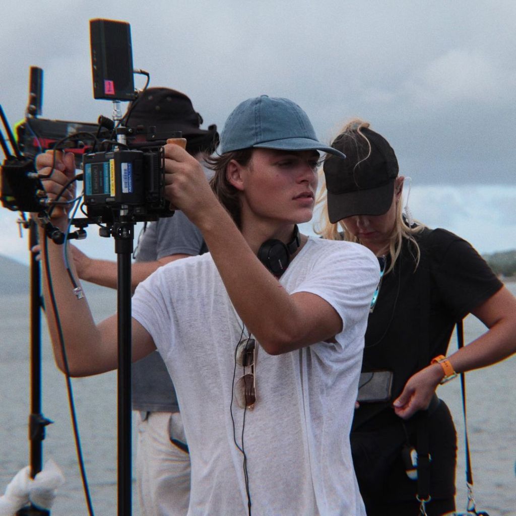 Damian Hurley makes his directorial debut by filming his own mother in risque scenes with another woman - after being unveiled as the photographer behind her bikini snaps
