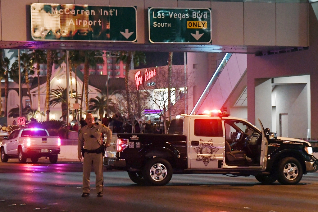 LAS VEGAS, NV - DECEMBER 31:  Las Vegas Metropolitan Police Department officers close Tropicana Avenue near the Las Vegas Strip on December 31, 2017 in Las Vegas, Nevada. An estimated 330,000 people are celebrating New Year's Eve on the Strip and in downtown Las Vegas. In the wake of October's mass shooting on the Strip, the state more than doubled the normal number of Nevada Army National Guard personnel working on New Year's Eve to 360 to join 1,500 on-duty police officers along with spotters, snipers and federal resources. 