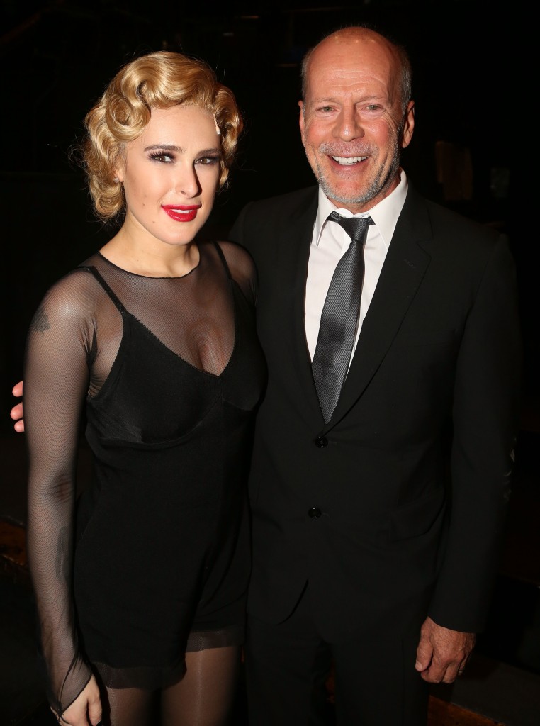 Rumer Willis and father Bruce Willis pose together.