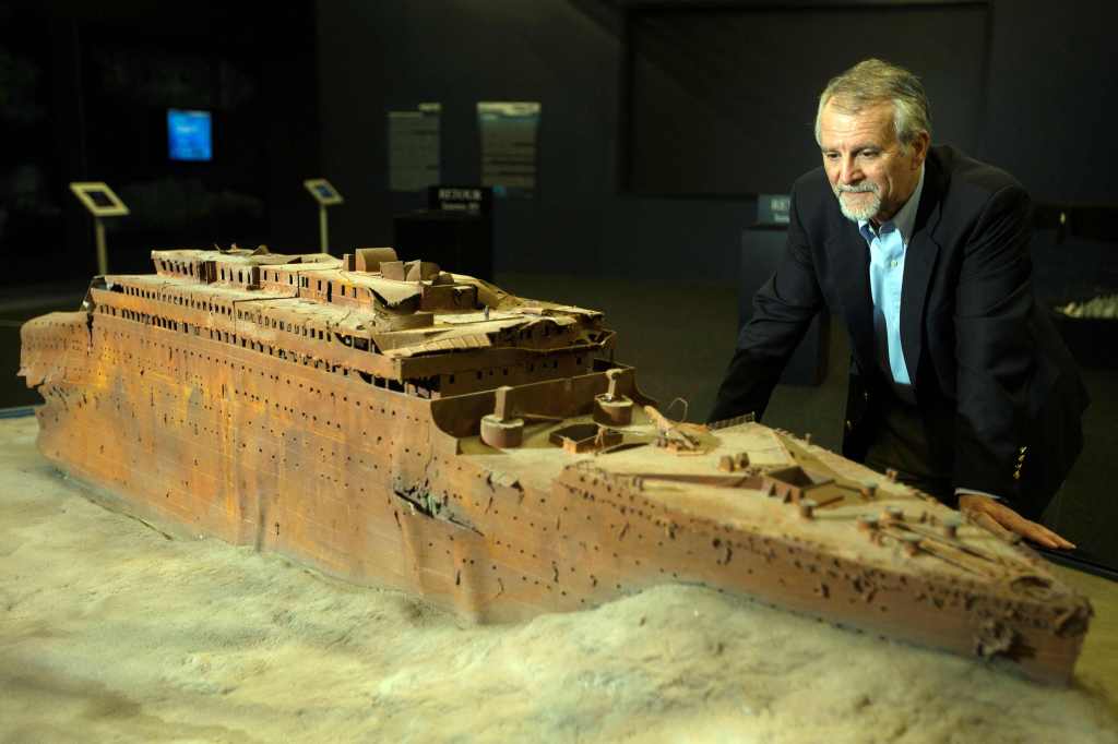 Leading Titanic explorer Paul-Henri Nargeolet is pictured in 2013 examining a model of the famous sunken ship.