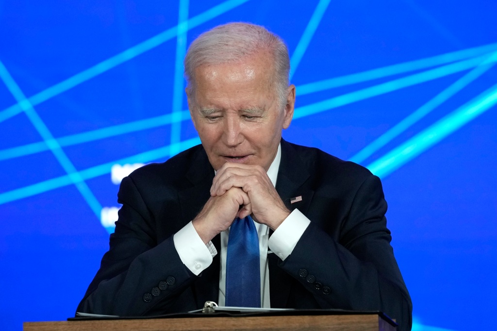 President Joe Biden listens as reporters ask questions about Hunter Biden.