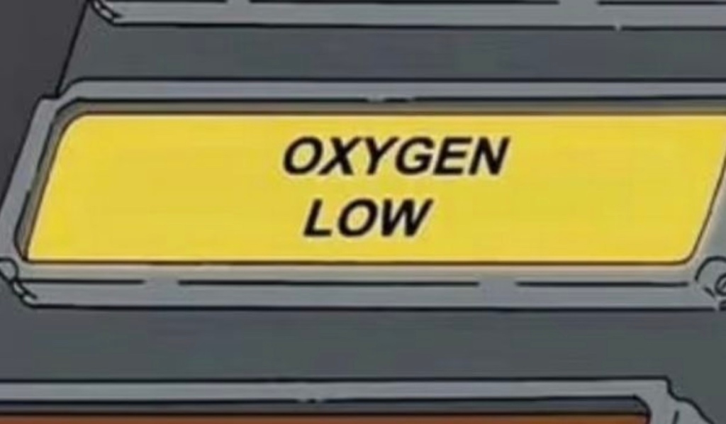 Starting to panic, Simpson attempts to wrench himself free only for the sub's "low oxygen" light to begin flashing before he descends into a coma. 