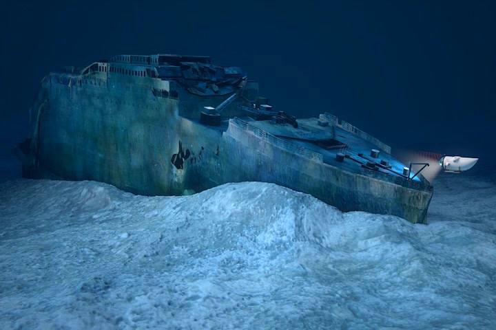 A rendering of the OceanGate submersible off the bow of the Titanic wreckage.