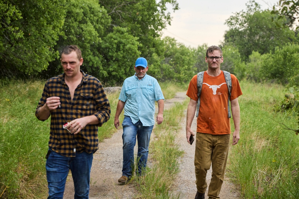 Gary Faust, Jamie Hammond, and Tim Bolding of DASH Austin walk along the Williamson Creek Greenbelt in Austin.