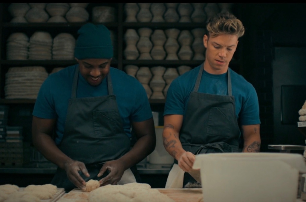 Marcus (Lionel Boyce) and Luca (Will Poulter) making pastries