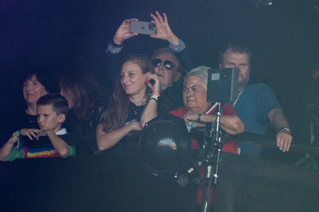 Paul McCartney in the Glastonbury crowd watching Foo Fighters.