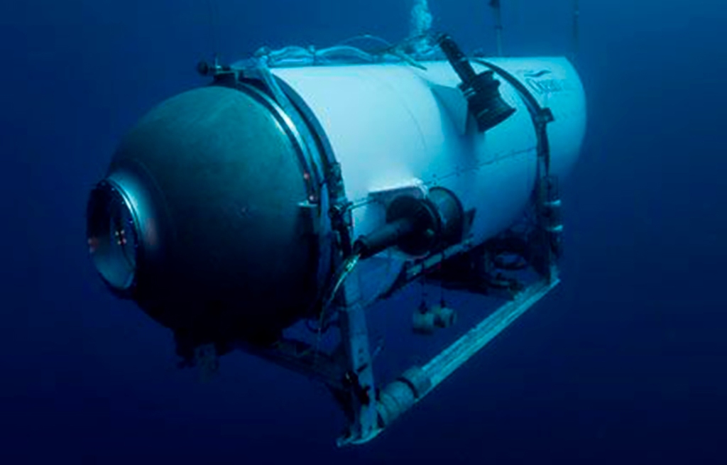 A Coast GuaFive explorers who boarded the Titan submersible early June 18 and descended to the depths of the Atlantic bound for the Titanic wreckage 12,500 feet below.rd Air Station Elizabeth City, North Carolina HC-130 Hercules airplane flies over the French research vessel, L'Atalante approximately 900 miles East of Cape Cod during the search for the 21-foot submersible, Titan, June 21, 2023 over the Atlantic Ocean.