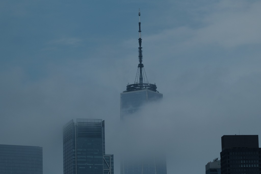 Heavy clouds hang over One World Trade Center as severe storms hovered over the New York area on Monday.