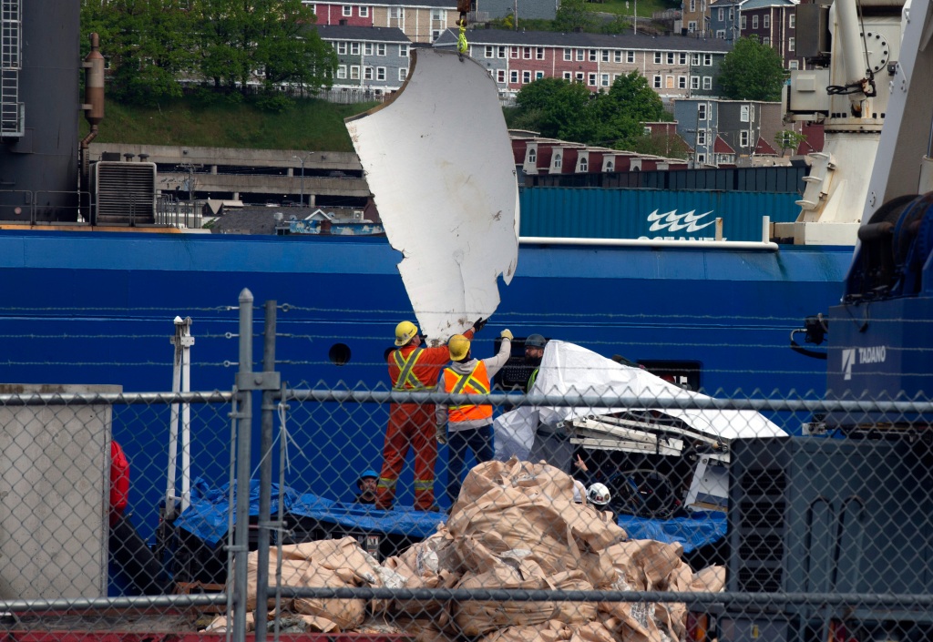 Debris from the Titan submersible, recovered from the ocean floor near the wreck of the Titanic, is unloaded from the ship Horizon Arctic at the Canadian Coast Guard pier in St. John's, Newfoundland, Wednesday, June 28, 2023.