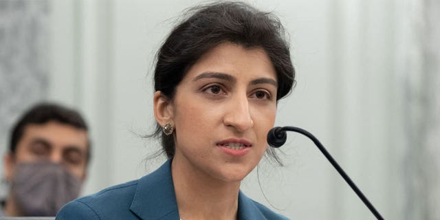 Lina Khan in front of microphone at hearing