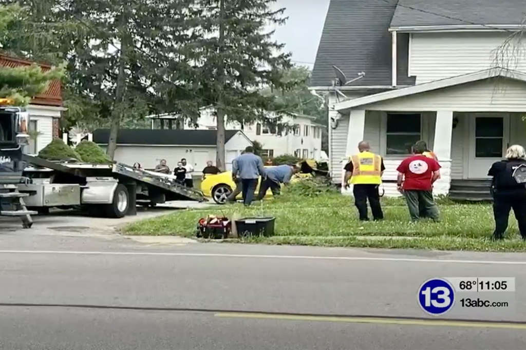 The Camaro attempted to flee police by driving at a high rate of speed before crashing into a house.