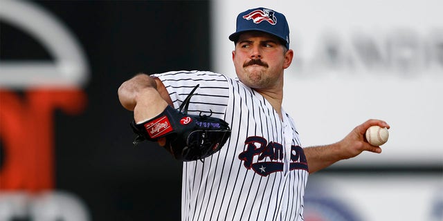 Carlos Rodon throws pitch