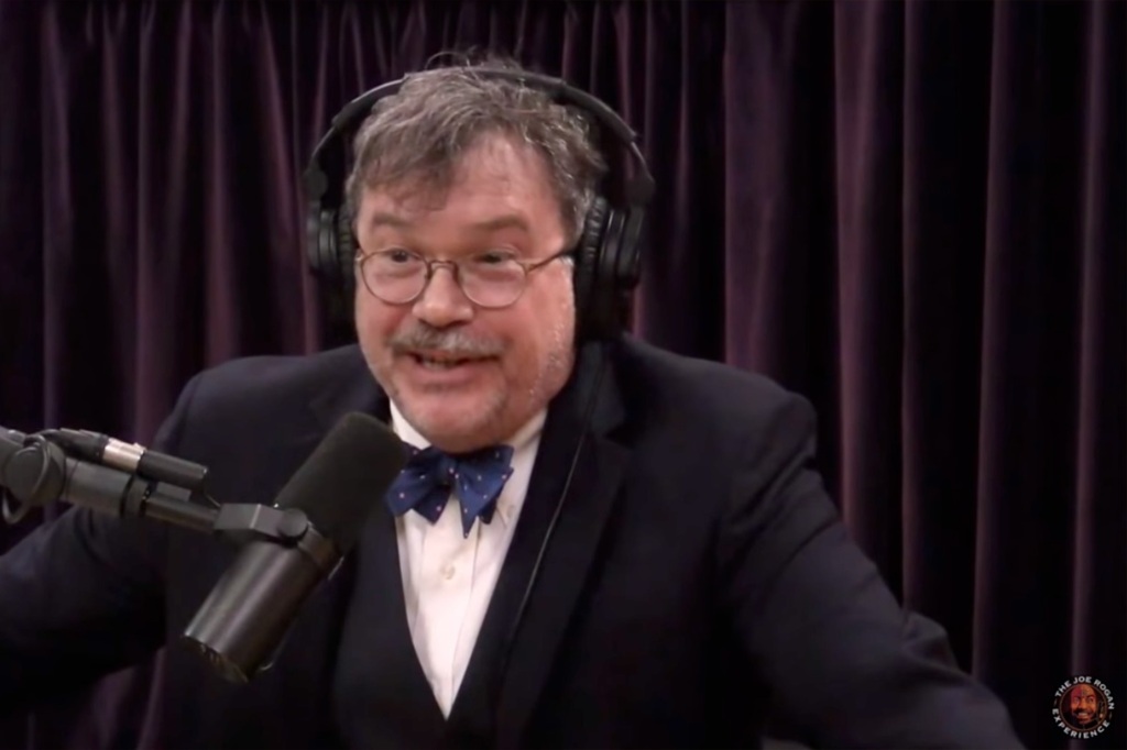 Vaccine researcher Dr. Peter Hotez admits to Joe Rogan that he's a "junk foodoholic." 