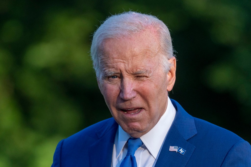 President Joe Biden squints into the sun as he walks from Marine One upon arrival on the South Lawn of the White House, Thursday, June 1, 2023, in Washington.