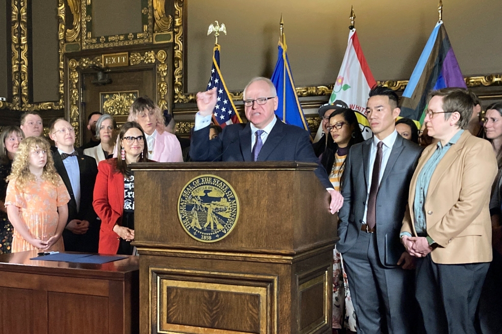 Democratic Minnesota Gov. Tim Walz speaks at a ceremony before signing an executive order on Wednesday, March 8, 2023, at the State Capitol in St. Paul, Minn.