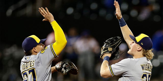 Joey Wiemer and Willy Adames celebrate