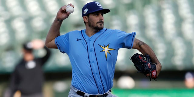 Zach Eflin throws a pitch