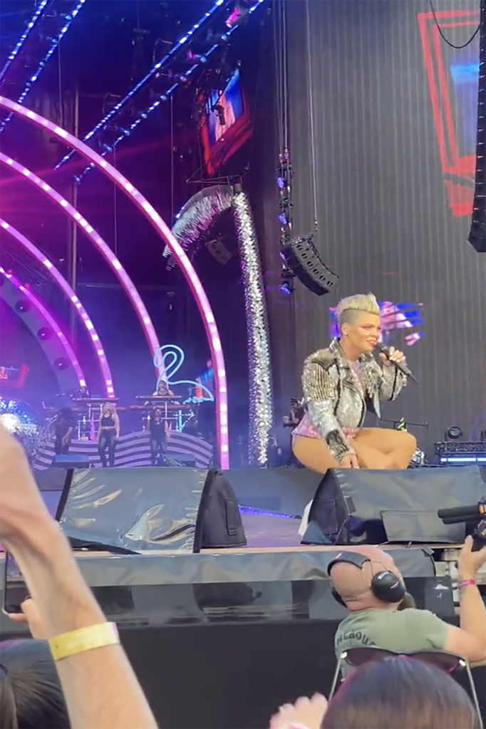 Pink placed the package down behind the front-of-stage speakers, and continued performing. 