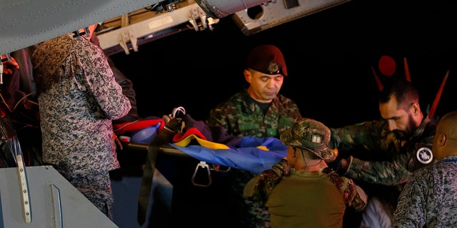 Children being transported to hospital on a plane