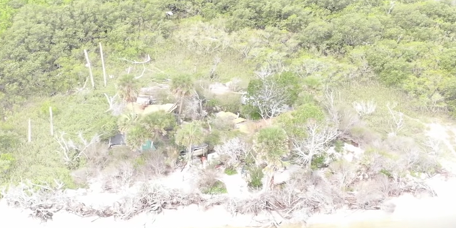 aerial view of island populated by squatters