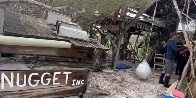 encampment on a squatter-occupied Florida island