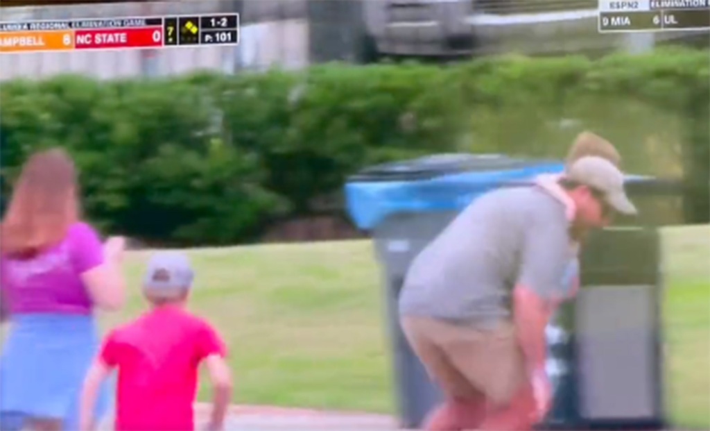 While running toward the foul ball, the dad began to lose his balance.